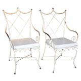 Pair of painted iron chairs