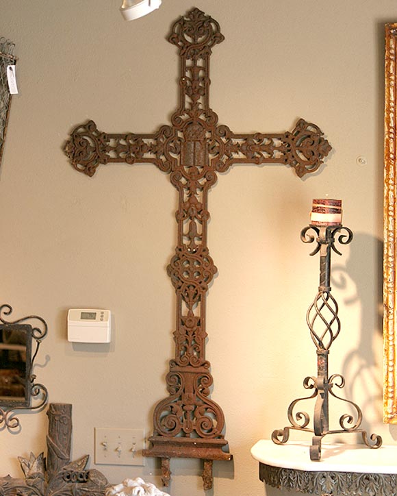 Pierced iron roadside crucifix.