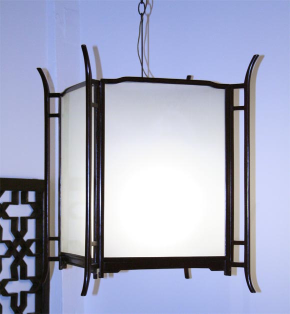 Square rosewood framed lantern with glass panels from Guangdong Province, China.  Lantern does not come wired.