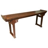 A 19th Century Qing Dynasty Carved Elm Console A 19th Century Qing Dynasty Carved Elm Console