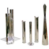 A Group of Silver and Plate Vases