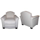 Pair of large Club chairs by Jules Leleu