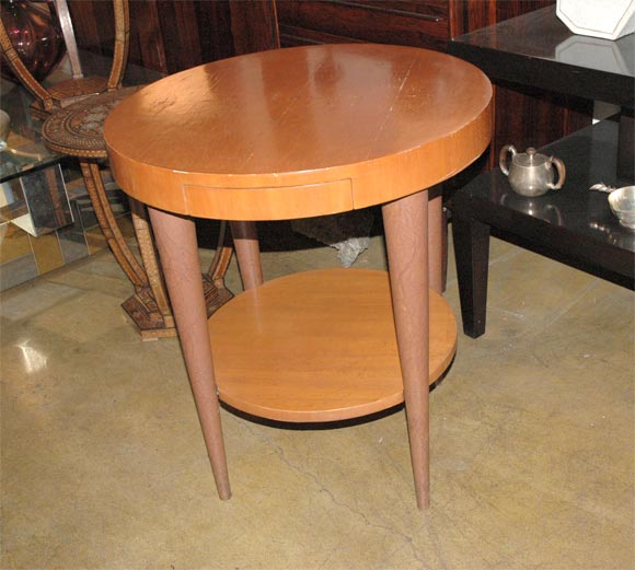 Occasional table with leather wrapped legs.Labeled and made for Herman Miller.(as shown in picture)