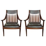 Pr. of rosewood carved back armchairs by John Nyquist