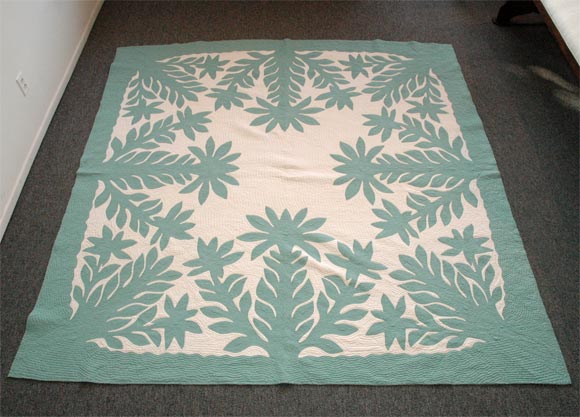 THIS MINT GREEN HAWAIIAN QUILT IS SUCH A UNUSUAL COLOR AND PRISTINE CONDITION ,IT IS FROM THE 1930'S AND HAS FANTASTIC ECHO QUILTING,THIS QUILT IS ALSO LARGE IN SIZE AND WOULD FIT A QUEEN OR KING SIZE BED.IT IS VERY HARD TO FIND HAWAIIAN QUILTS