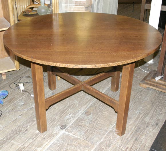 Mission breakfast, large lamp/game table, or small dining table.  The table is marked #629 but we do not know the manufacturer.  It has been refinished and has a notched base.  Tiny wholes are around the outside edge, so it probably had a leather