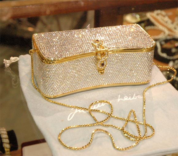 Anyone who knows Judith Leiber does not need a description. For those who don't, some people display their collections of her bags, thus this listing. Her pieces are works of art, all hand made in limited editions. This is one of her jeweled bags