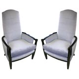 A Pair of Classic Modern High-Back Armchairs