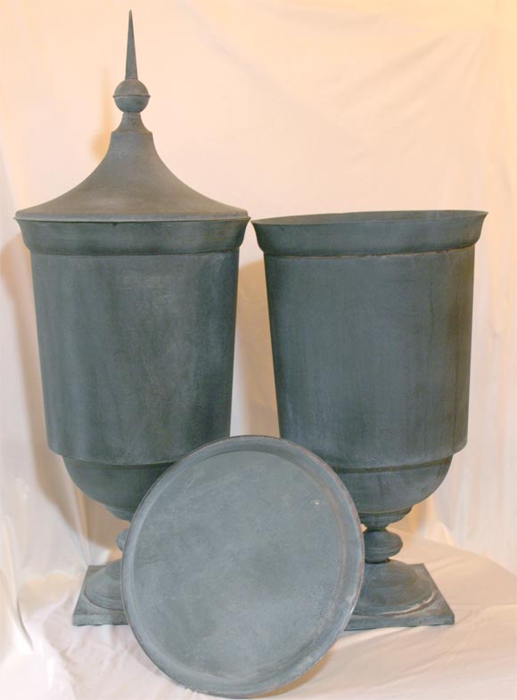 PAIR OF ZINC LIDDED URNS 2