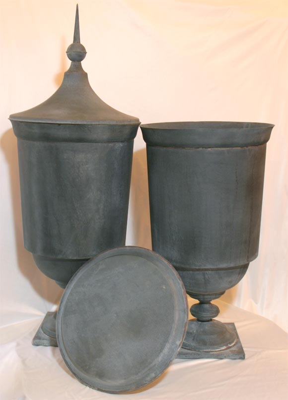 PAIR OF ZINC LIDDED URNS 3