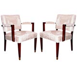 A Set of Four Walnut and Upholstered Arm Chairs