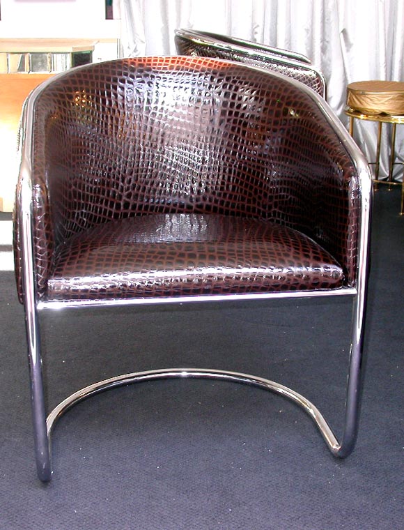 A Pair of Chrome and Patent Leather Tub Chairs by Thonet