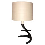 A French Patinated Bronze and Faux Ivory Table Lamp