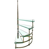 A Glass and Brass Spiral Step Table by Fontana Arte.