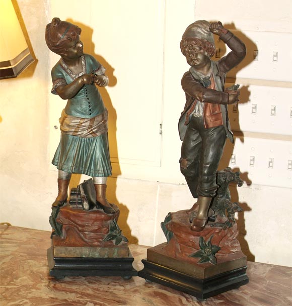 Pair painted spelter figurines turn of the 19th century