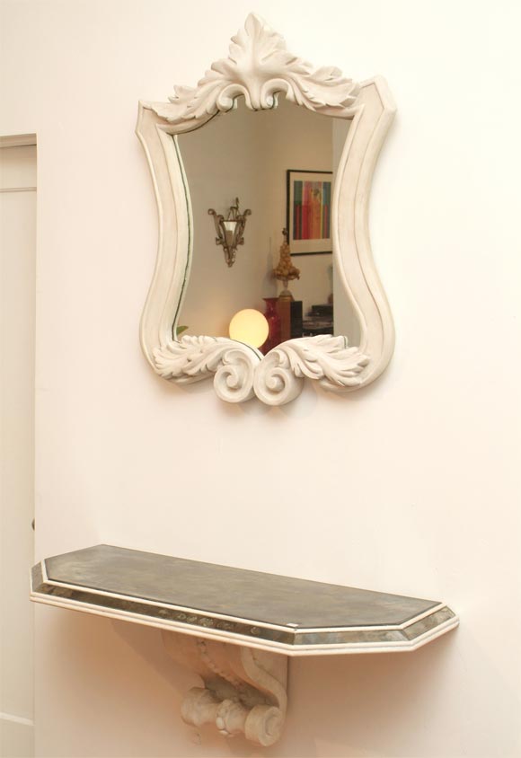Chic plaster antiqued mirror and matching console. Very heavy. 

**Please contact us directly if you are interested in pricing / shipping information**