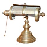 Early electric desk lamp with mesh visor