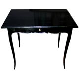 Ebonized Table with Central Drawer on whimsical legs