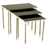 A Set of French Silver Plate and Black Glass Nesting Tables