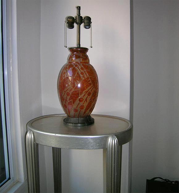 Incredible acid cut 1920's Daum Nancy Lamp; mottled colored; original iron mounts by L. Katona, a contemporary and equal to Edgar Brandt. Signed in both the glass -- 