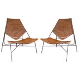 Pr. of Wicker, wood & iron lounge chairs by Arthur Umanoff