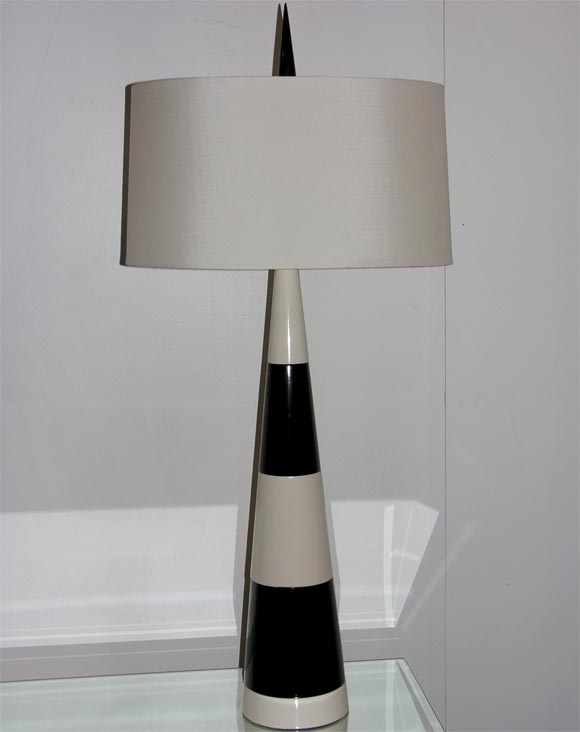 Ebony and ivory cone lamp.