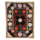 1920'S HAND HOOKED  FOLKY FLORAL MOUNTED RUG