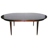 a fine dinning room table by jansen