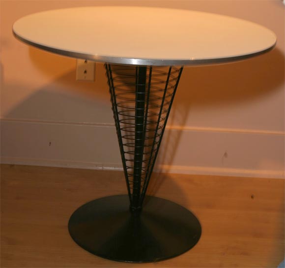 Danish modern table by Verner Panton, Mid-Century with wire base and white formica top.