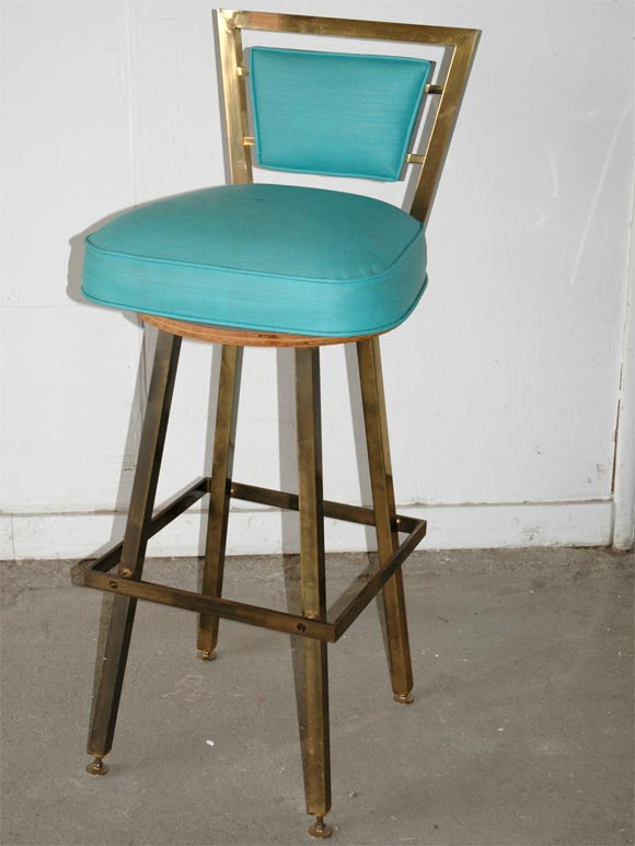 Set of three brass and vinyl barstools. Original vinyl.