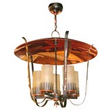 Lantern chandelier in wrough-iron and polished copper Lantern chandelier in wrough-iron and polished copper