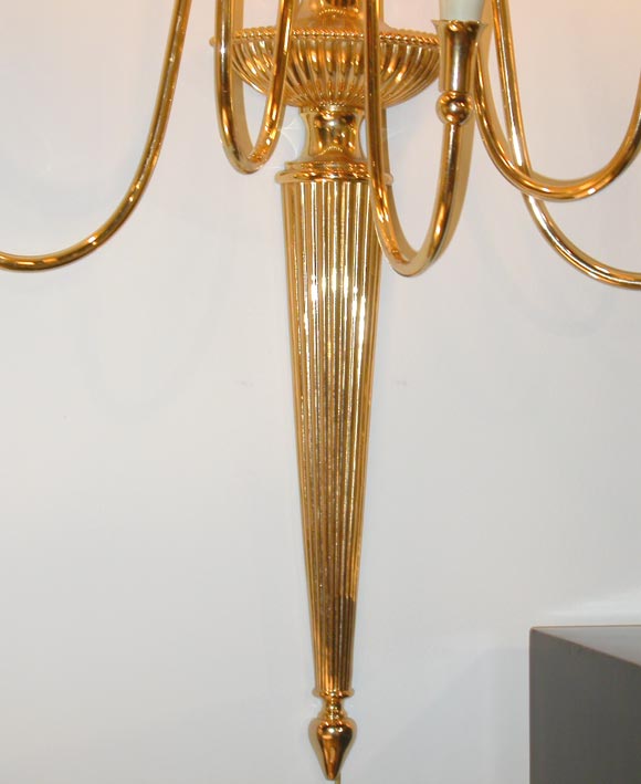 Pair of gold-plated sconces by Fontana Arte at 1stdibs
