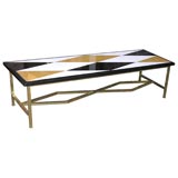 A Modernist brass Table with onyx and marble top A Modernist brass Table with onyx and marble top