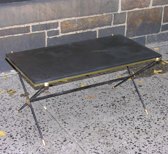 A pair of French modernist tables with slate tops.
