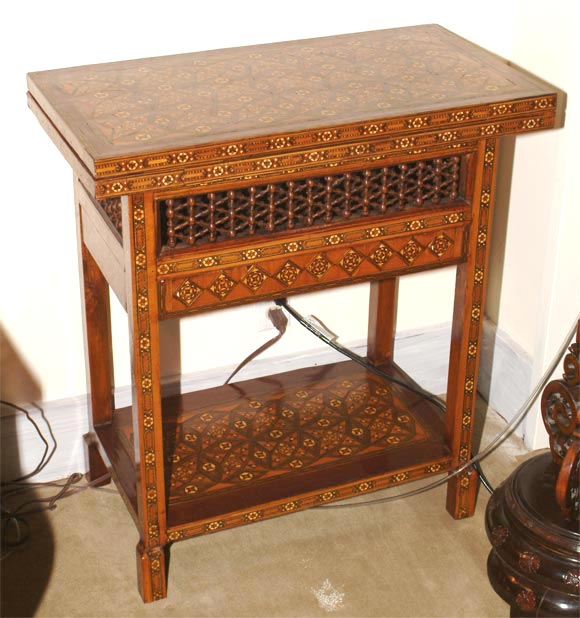A nice pair of decorative Ottoman inlaid game tables.  Elaborately inlaid with various woods and bone.  The tops folding open to provide a leather top playing surface.