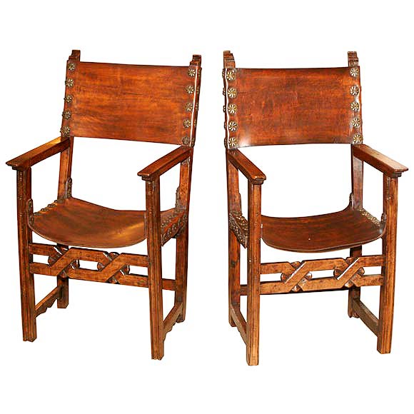 A pair of Spanish Baroque arm chairs circa 1700