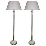 pair of floor lamps by Jacques Adnet