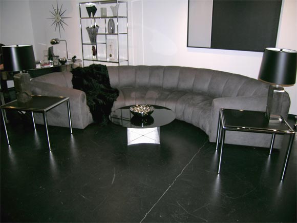 C shaped sofa in in grey ultra suede