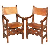 Pair of Spanish Arm Chairs with leather seats/backs