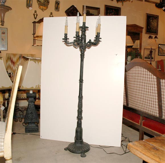 Regency  pair of iron pedestal torcheres