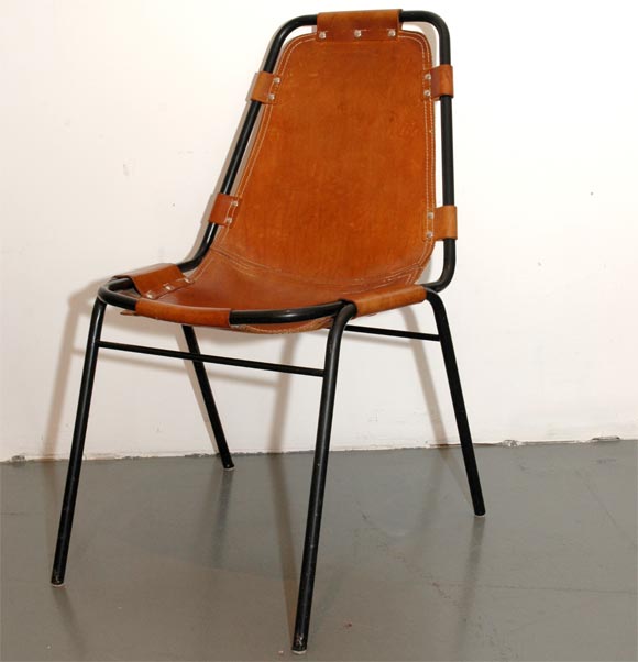 Chairs are attributed to Charlotte Perriand, made for the Amenagment de la Station des Arcs 1800. Chromium plated tubular steel frame with brown leather seat. Leather has beautiful patina.