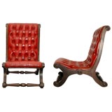 Used Pair of Red Leather Tufted Lolling Chairs