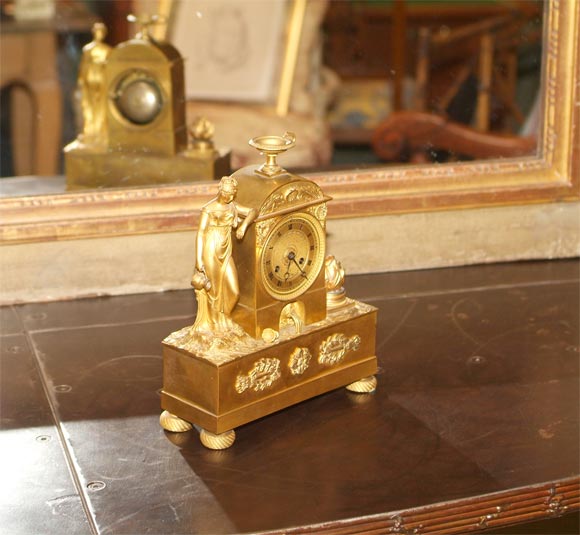 A French Directoire Gilt-Bronze Mantel Clock