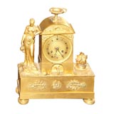 A French Directoire Gilt-Bronze Mantel Clock