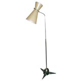 A Pivoting Floor Lamp with Iron Star Form Base, by Matthieu