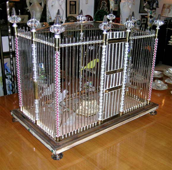 A Blown and Zanfirico Glass and Brass Birdcage. By Charles Lin Tissot for Venini, circa 1959. He combines yellow and white milky opaline glass birds with clear glass ribs which are internally decorated with twisted white glass threads in the