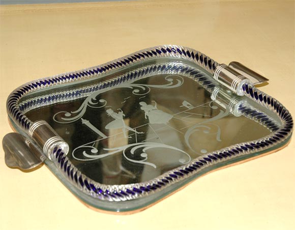 C. 1920 Hand etched Venetian vanity tray with silverplate handles. It is rimmed with twisted cobalt glass, and the etched scene seems to be of a couple in Venice. There is some slight natural ghosting to the mirror. It's a beautiful piece!