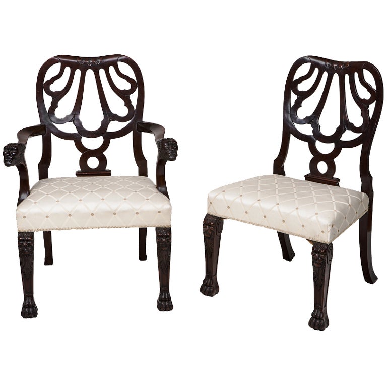 Set of 12 Carved Mahogany Dining Chairs, after Giles Grendey