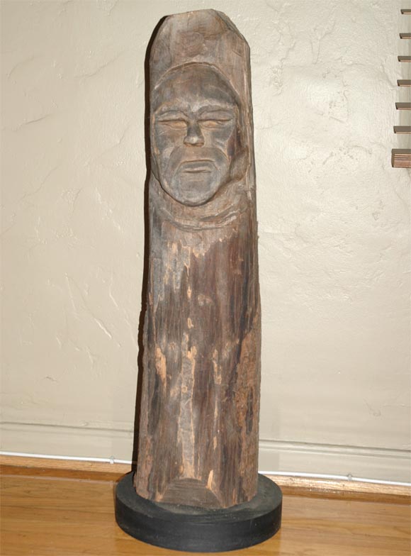 19th century carving of an Indians face out of one piece of wood-great piece of Folk Art, as found condition in the state of Maine, a custom-made mount is the base (wood and iron), great detail and workman ship by the carver.