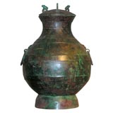 Bronze patinated vase with removable lid